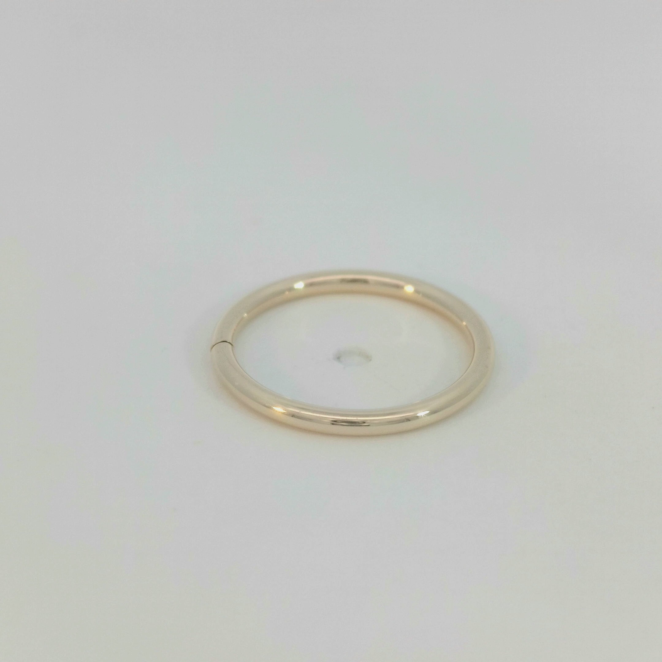 Cup and Divot Seam Ring